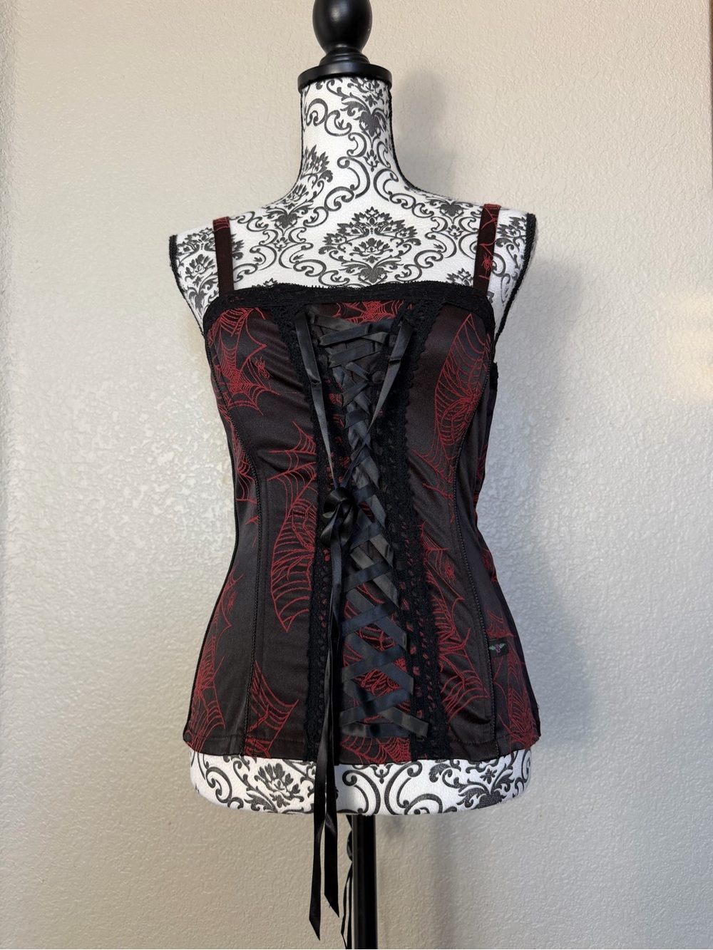 Tripp NYC red and black spiderweb corset